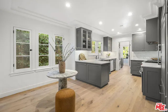 a large living room with a large window