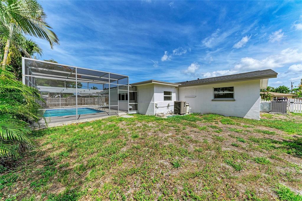 2544 Orsova Way Sarasota, FL 34231 - Photo 39 of 39 a house view with a backyard space