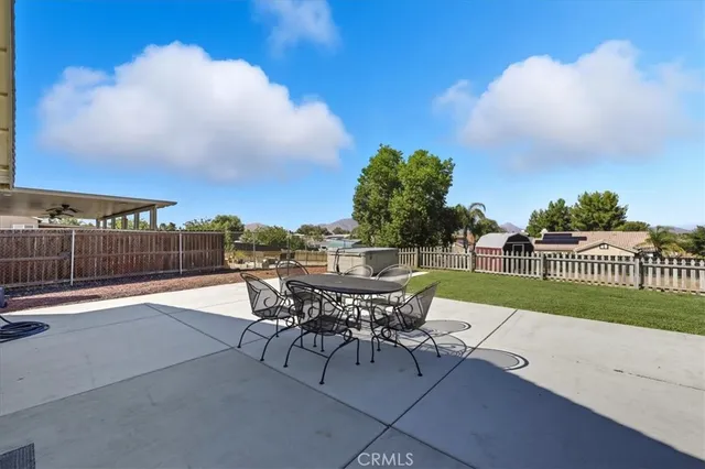 a bathroom with a sink vanity granite and toilet