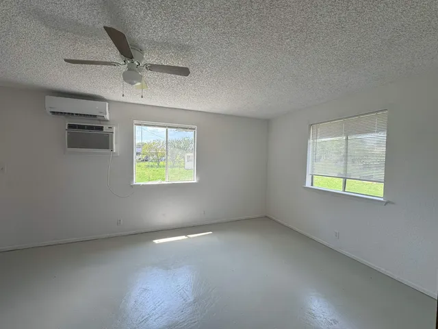 an empty room with windows