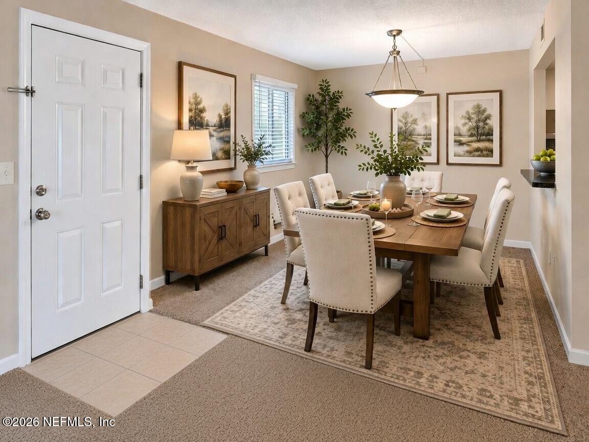 355 Monument Road, Unit 12 A1 Jacksonville, FL 32225 - Photo 10 of 21 Virtually Staged Dining Room