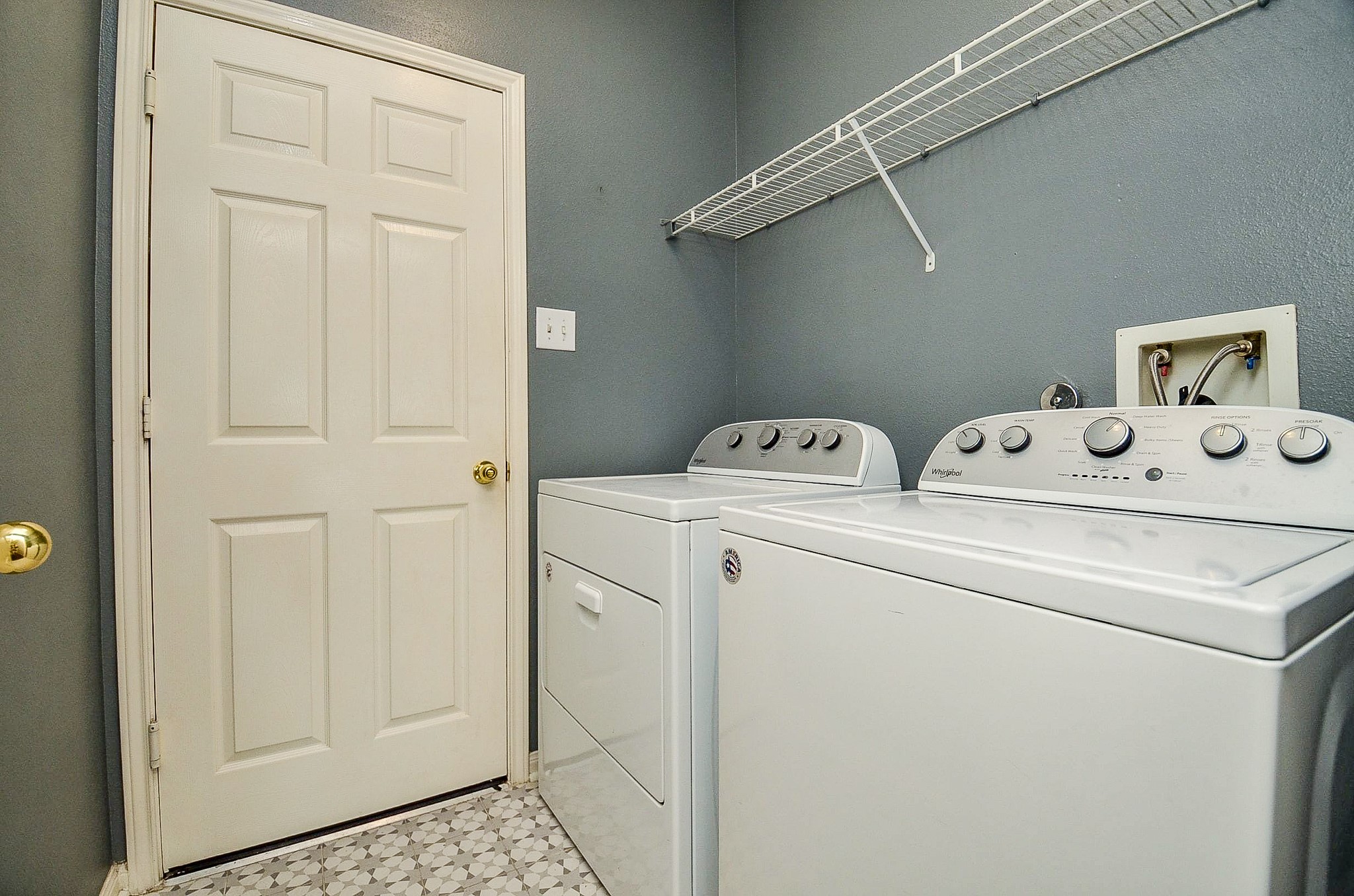 91 Rodeo Drive Manvel, TX 77578 - Photo 27 of 38 The utility room is on the first floor.