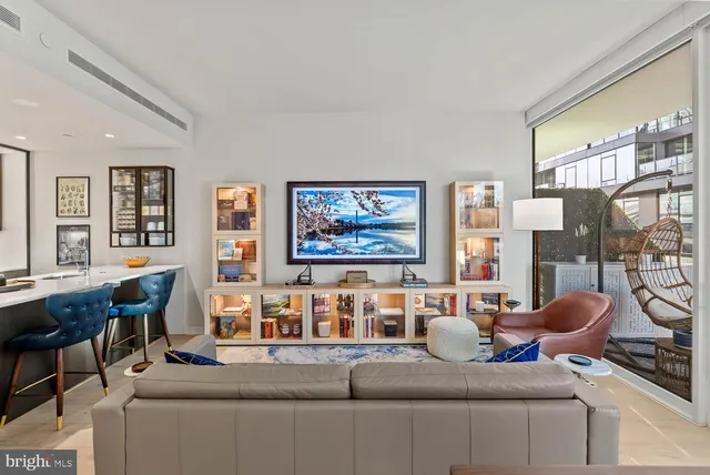 a bathroom with a granite countertop shower mirror and a sink