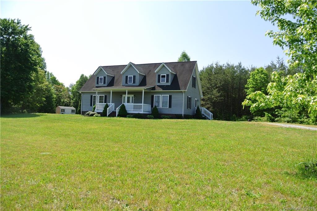 454 Gilmer Edwards Road Rutherfordton, NC 28139 - Photo 1 of 21 a house view with swimming pool in front of it