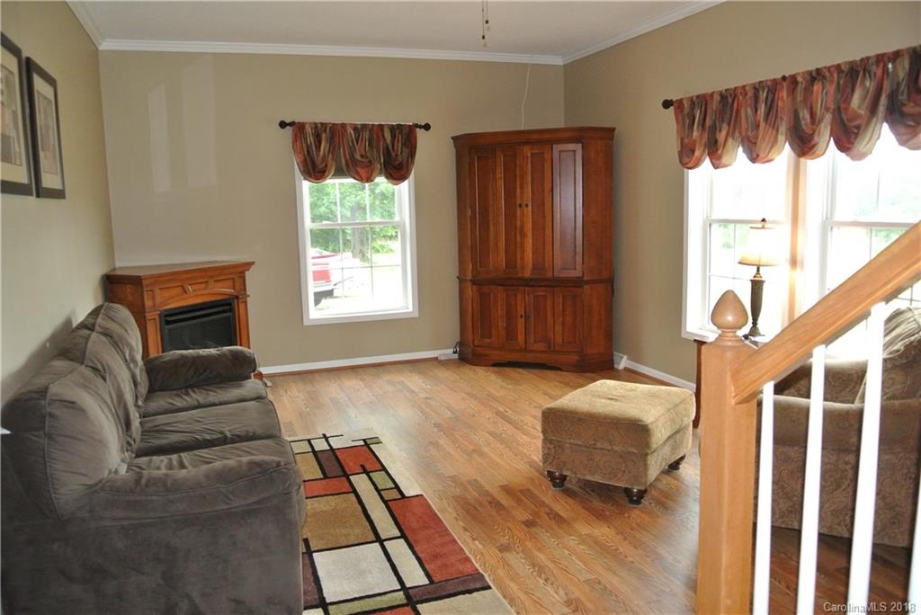 454 Gilmer Edwards Road Rutherfordton, NC 28139 - Photo 5 of 21 a bedroom with furniture and a window