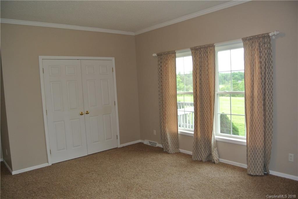 454 Gilmer Edwards Road Rutherfordton, NC 28139 - Photo 10 of 21 a view of an empty room with a window