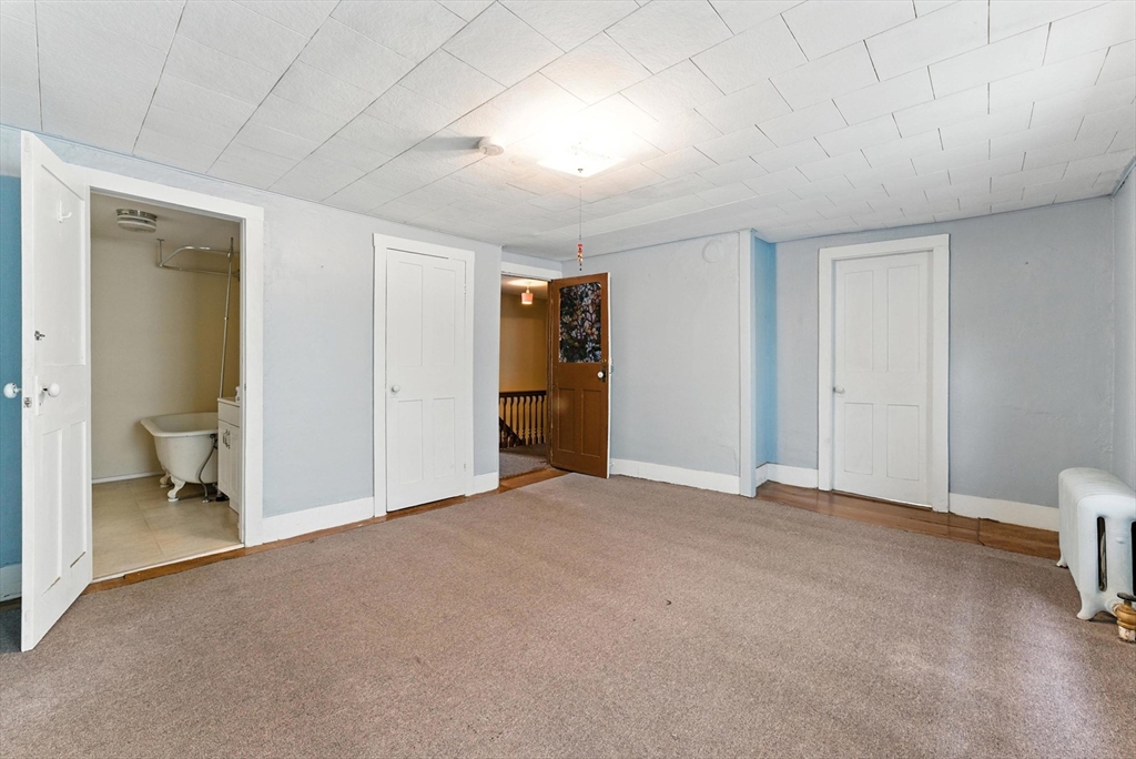 112 Grape Street Chicopee, MA 01013 - Photo 29 of 42 a big room with closet and a bathroom