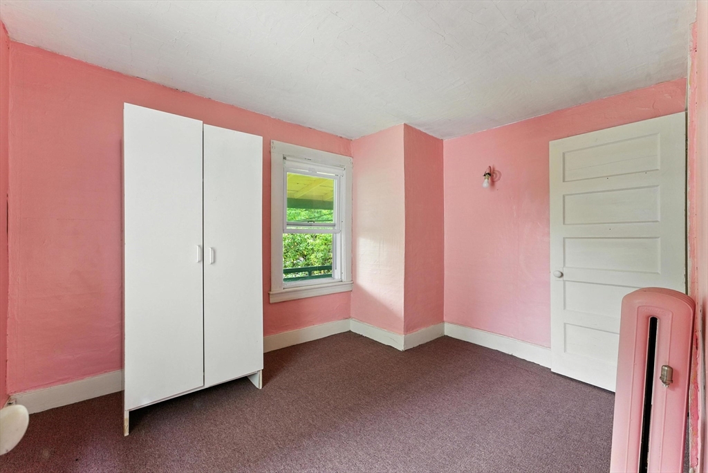 112 Grape Street Chicopee, MA 01013 - Photo 34 of 42 a view of an empty room with a window
