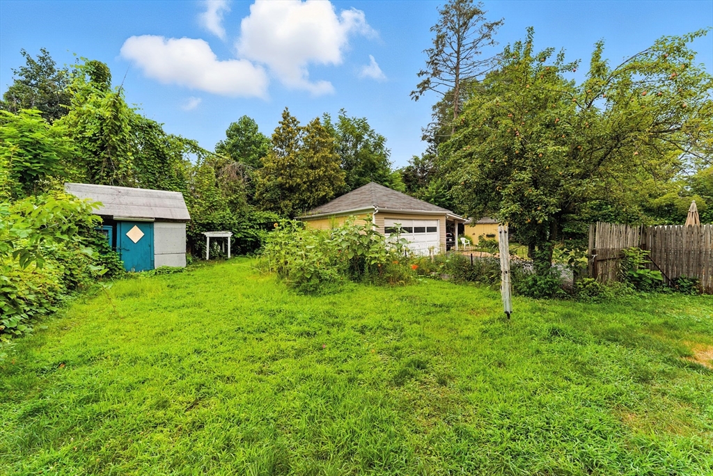 112 Grape Street Chicopee, MA 01013 - Photo 38 of 42 a front view of a house with garden
