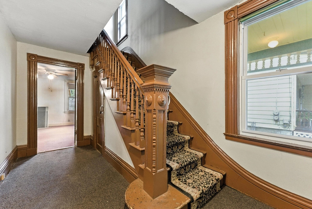 112 Grape Street Chicopee, MA 01013 - Photo 6 of 42 a view of entryway and hall with wooden floor