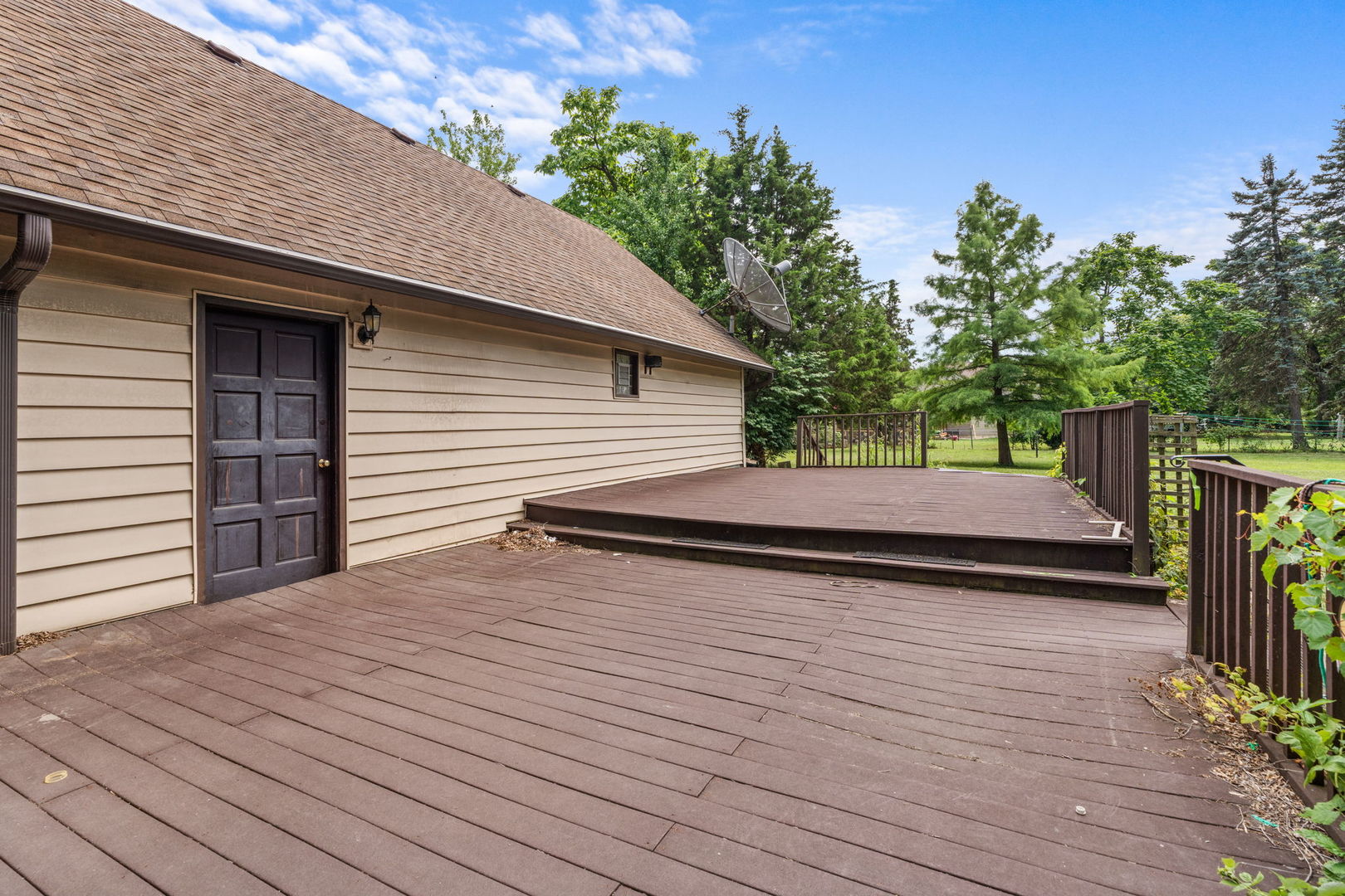 5N452 Central Road Itasca, IL 60143 - Photo 29 of 39 a view of a terrace with wooden floor and fence and a bench
