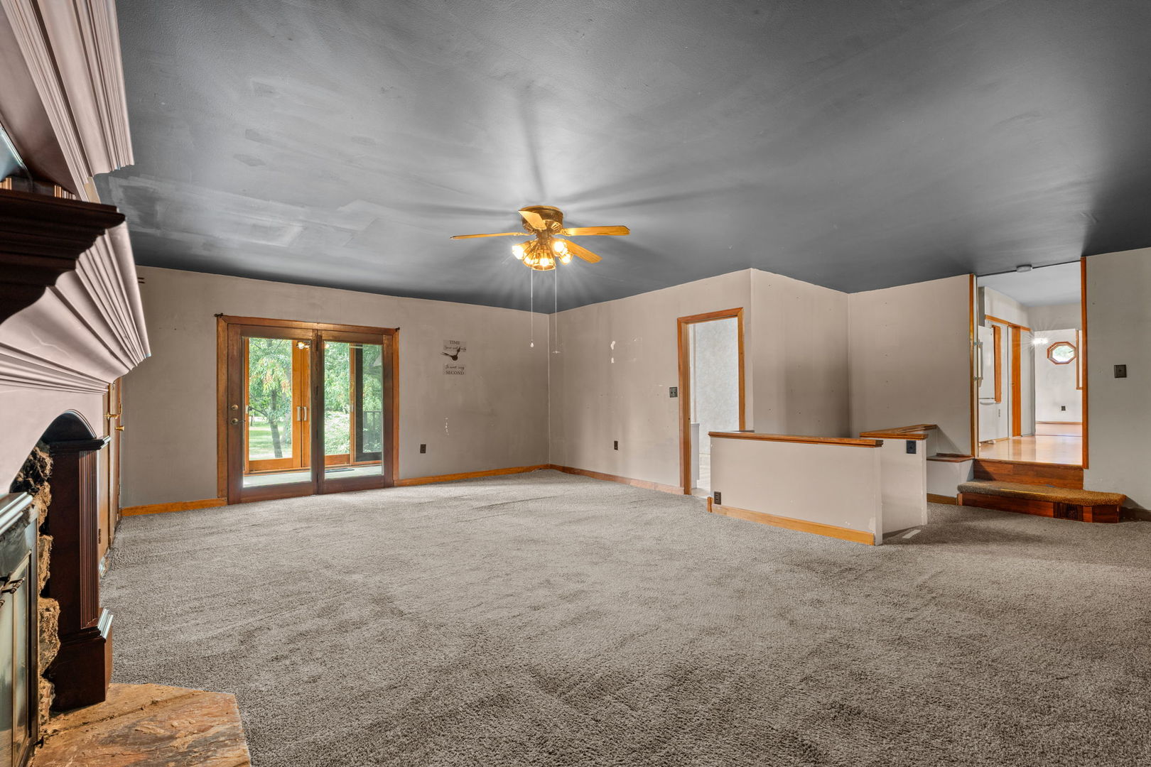 5N452 Central Road Itasca, IL 60143 - Photo 3 of 39 a view of an empty room with window and fireplace