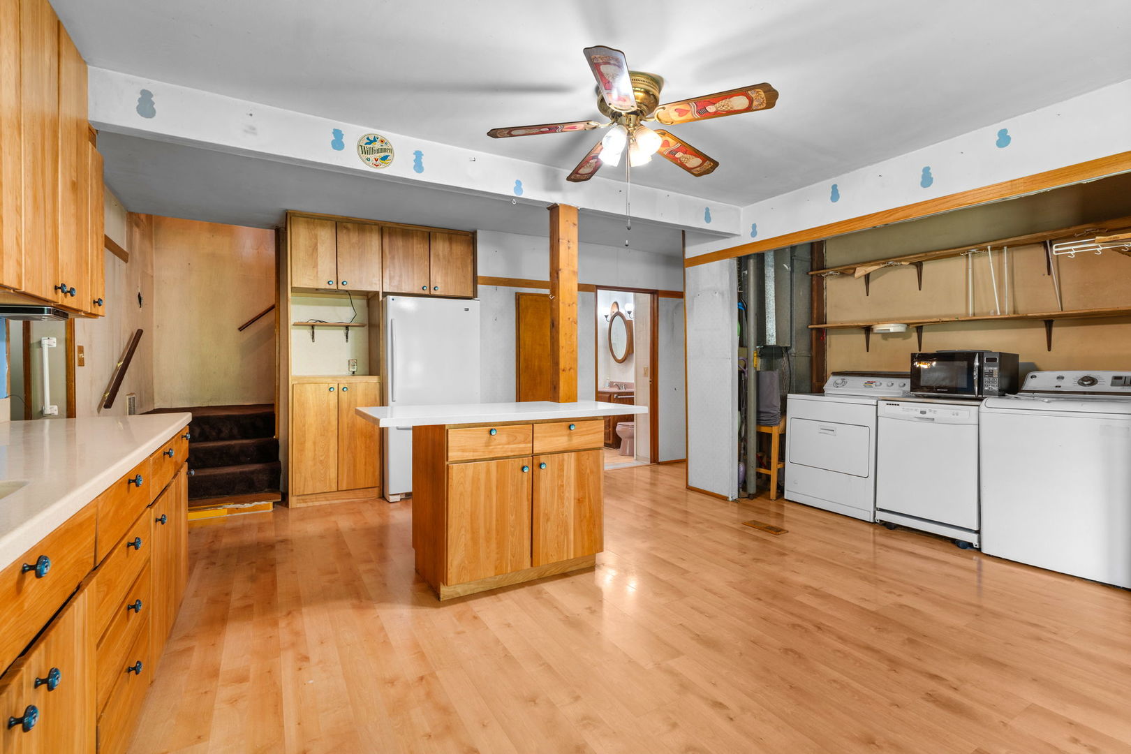 5N452 Central Road Itasca, IL 60143 - Photo 10 of 39 a kitchen with stainless steel appliances kitchen island granite countertop a refrigerator and a stove top oven