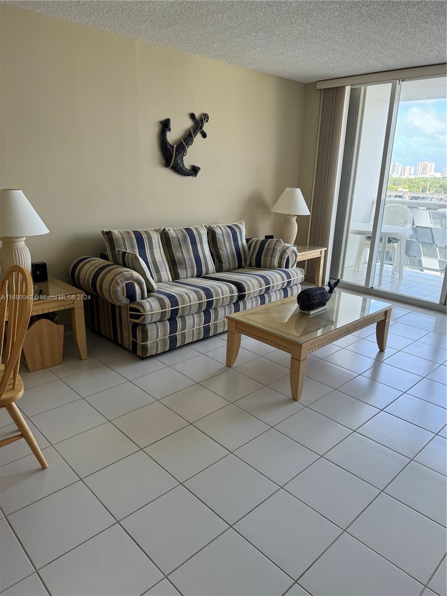 Sunset Harbour Miami Beach, FL 33139 - Photo 14 of 47 a living room with furniture and a large window