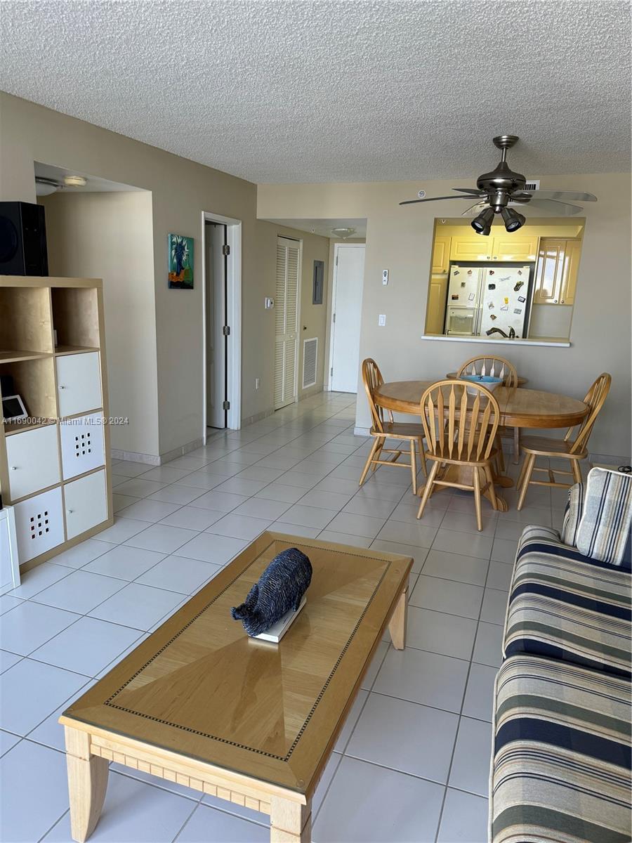 Sunset Harbour Miami Beach, FL 33139 - Photo 19 of 47 a living room with furniture and a flat screen tv