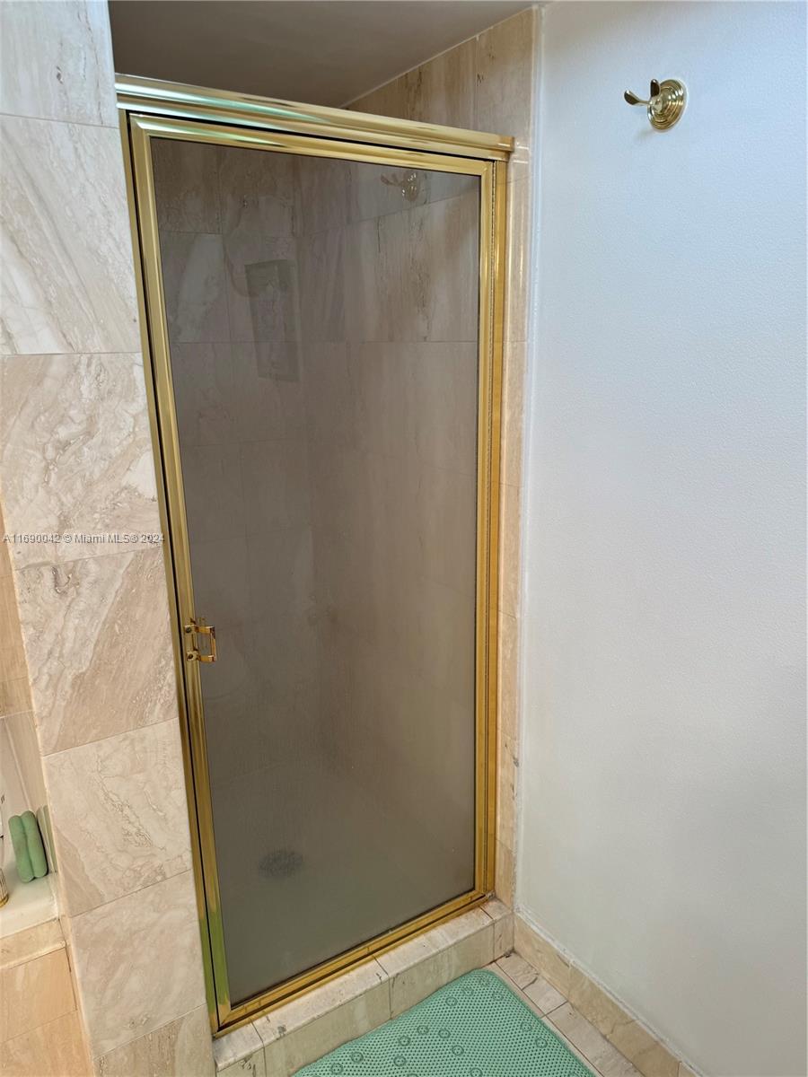 Sunset Harbour Miami Beach, FL 33139 - Photo 34 of 47 a bathroom with a glass shower door