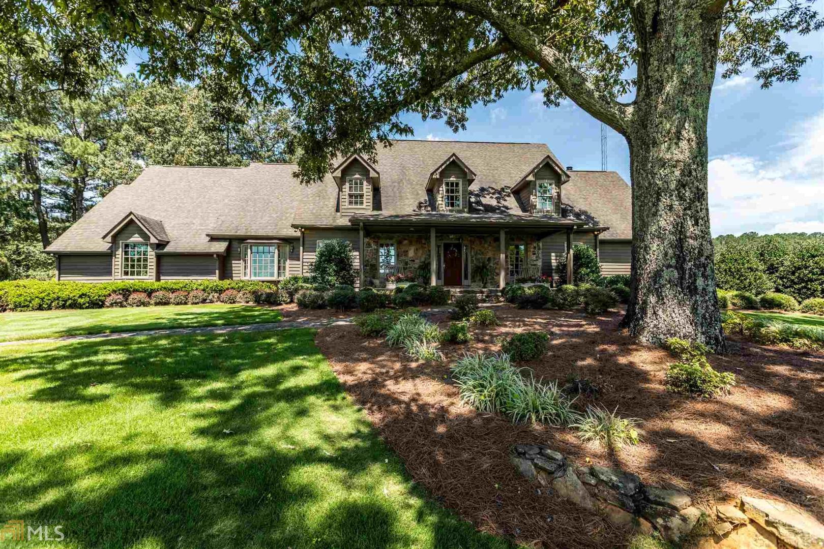 8866 Alabama Highway Rome, GA 30165 - Photo 1 of 1 a front view of a house with garden