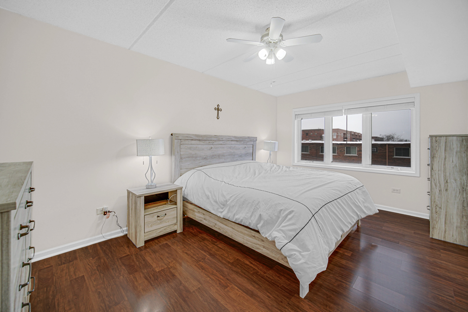 476 Alles Street, Unit 406 Des Plaines, IL 60016 - Photo 13 of 25 a bedroom with a bed and a window