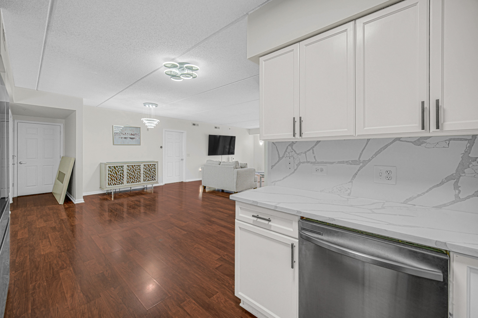 476 Alles Street, Unit 406 Des Plaines, IL 60016 - Photo 23 of 25 a kitchen with a sink cabinets and wooden floor
