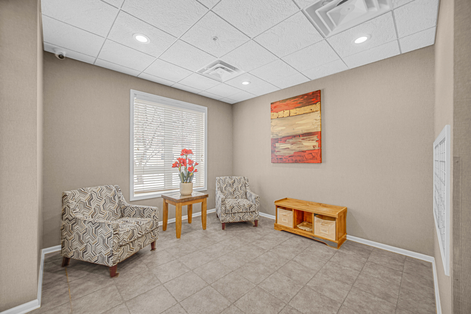 476 Alles Street, Unit 406 Des Plaines, IL 60016 - Photo 9 of 25 a living room with furniture and a window