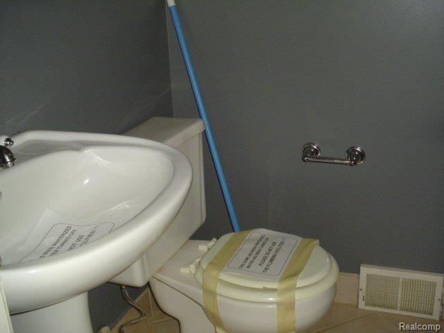 4674 12 Mile Road Warren, MI 48092 - Photo 11 of 13 Half Bathroom