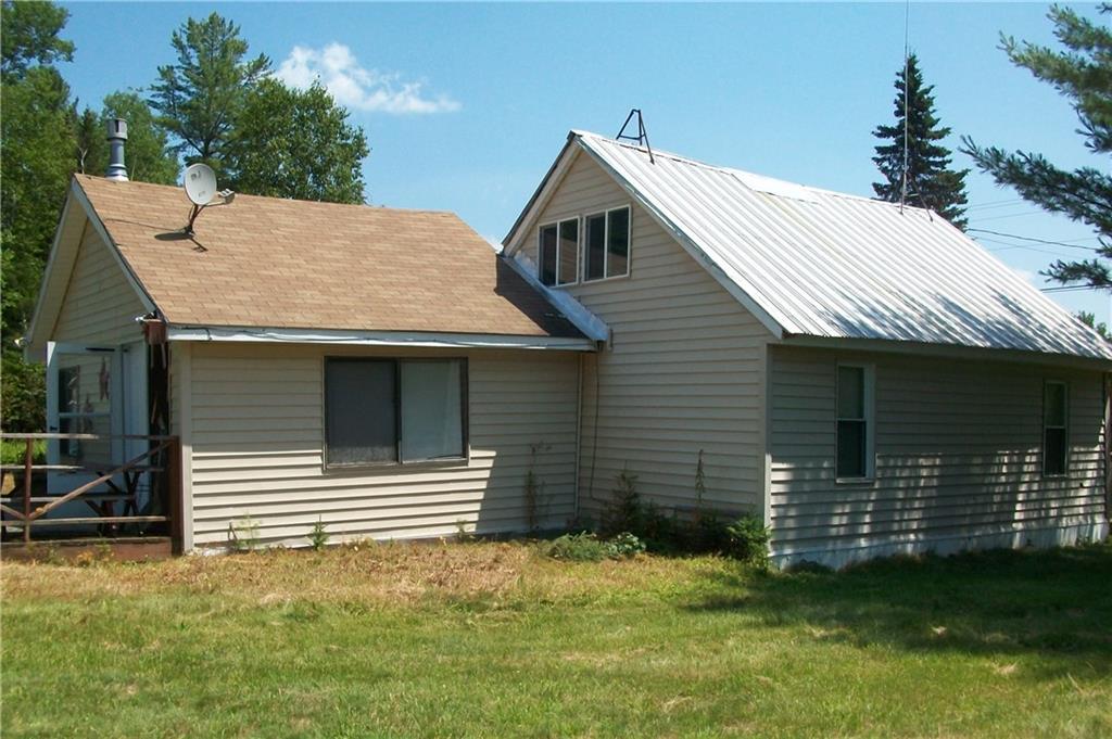 240 Stratton Road Dallas Plt, ME 04970 - Photo 20 of 23 Back of home with exit from master...