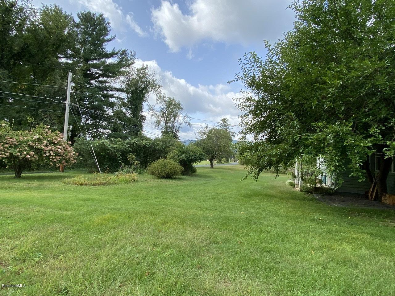 500 Salisbury Road Sheffield, MA 01257 - Photo 5 of 21 a view of a grassy field with trees