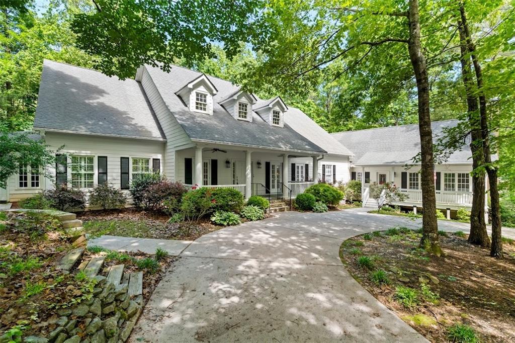 2058 Sewanee Court Villa Rica, GA 30180 - Photo 1 of 91 a view of a house with a yard and large tree