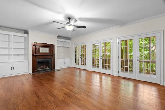 a view of a porch with wooden floor and roof