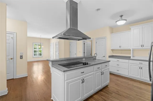 a bathroom with a sink vanity and mirror
