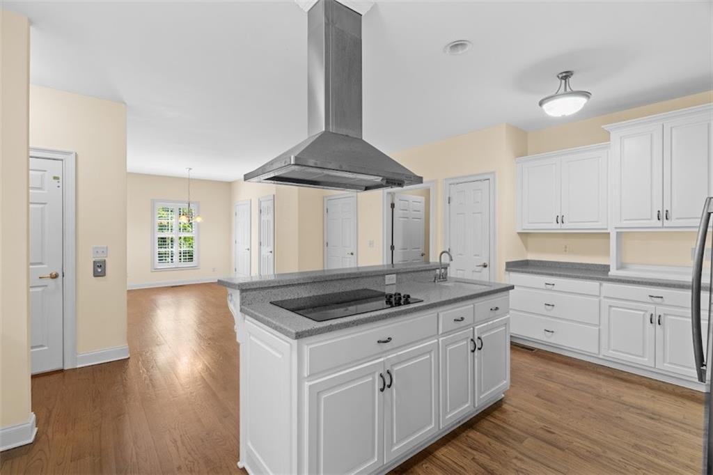 2058 Sewanee Court Villa Rica, GA 30180 - Photo 20 of 91 a kitchen with a sink stove and cabinets