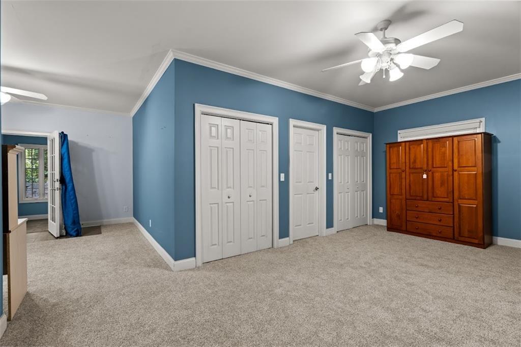 2058 Sewanee Court Villa Rica, GA 30180 - Photo 29 of 91 an empty room with windows and closet