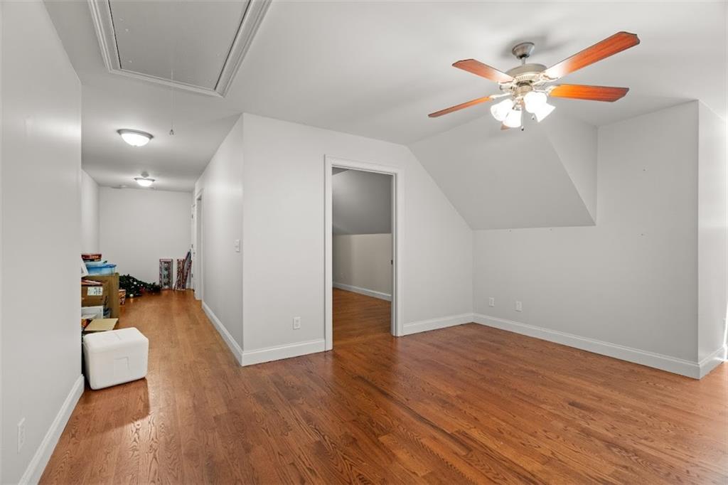 2058 Sewanee Court Villa Rica, GA 30180 - Photo 45 of 91 wooden floor in an empty room with a window