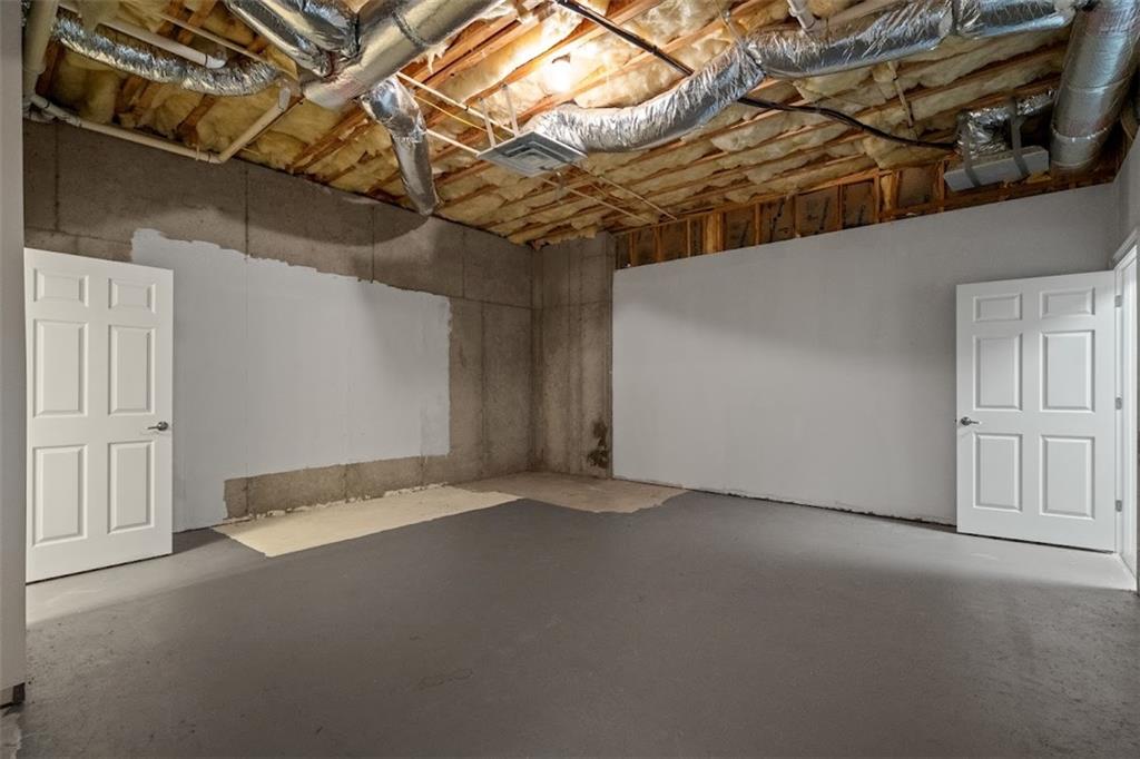 2058 Sewanee Court Villa Rica, GA 30180 - Photo 58 of 91 a view of a room with a bed and wooden floor