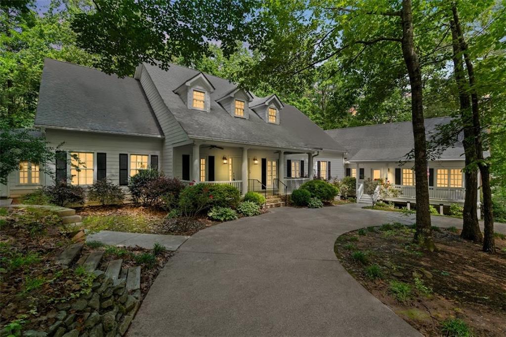 2058 Sewanee Court Villa Rica, GA 30180 - Photo 6 of 91 a front view of a house with a yard and outdoor seating