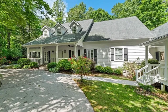 a view of entryway with wooden floor and stairs