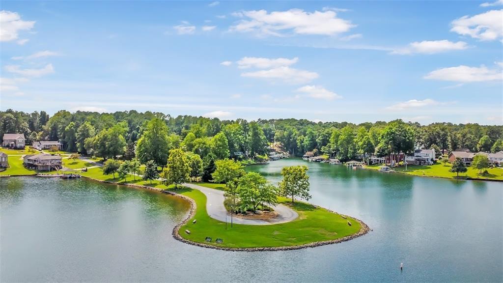 2058 Sewanee Court Villa Rica, GA 30180 - Photo 81 of 91 a view of a lake with a yard