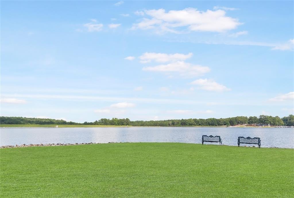 2058 Sewanee Court Villa Rica, GA 30180 - Photo 83 of 91 a view of a lake with houses in the back