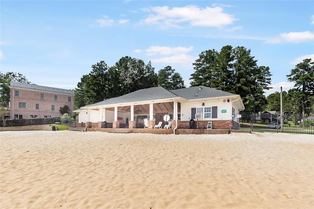 2058 Sewanee Court Villa Rica, GA 30180 - Photo 87 of 91 a view of a house with a yard covered with snow in the background