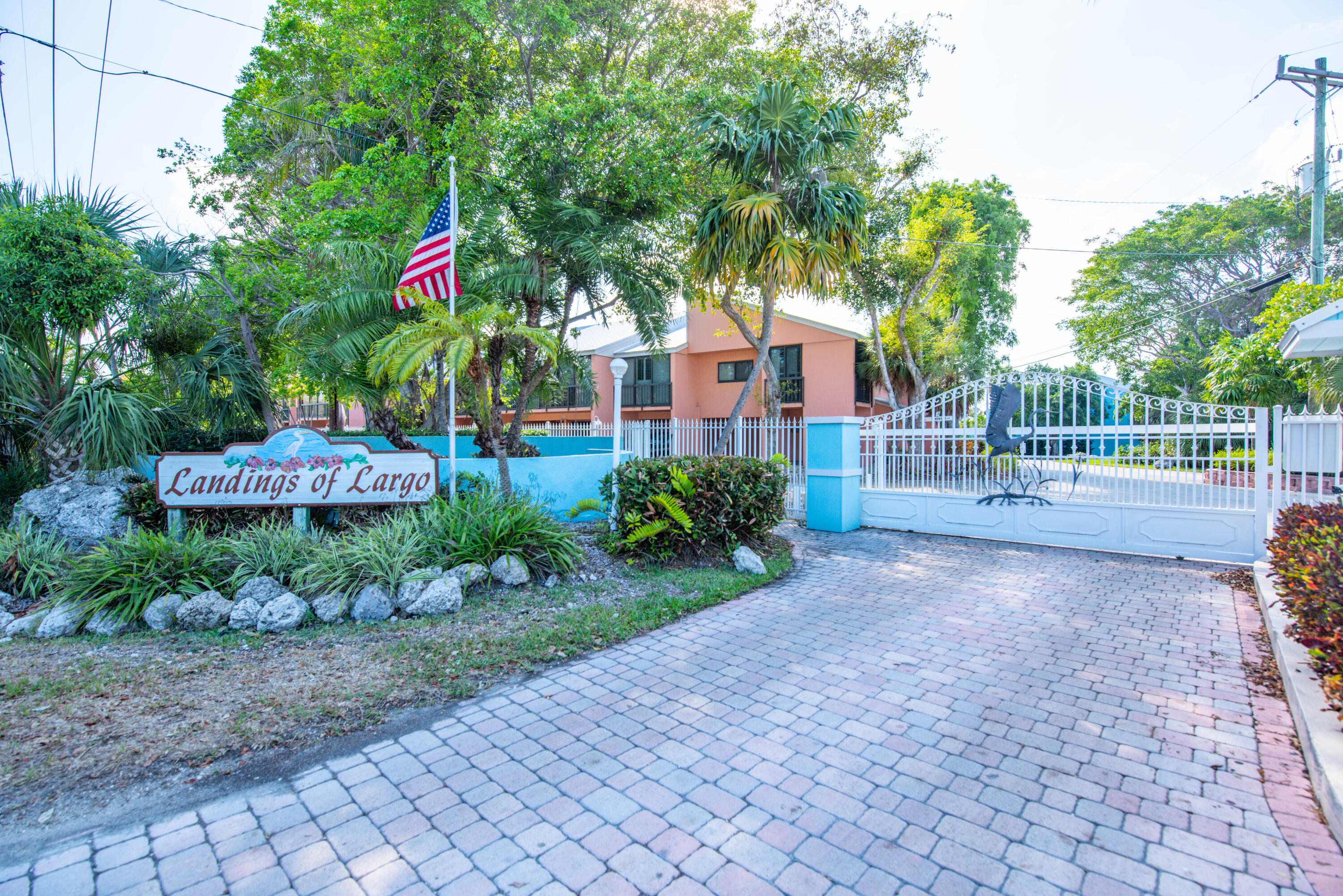 a house with lots of trees in the background