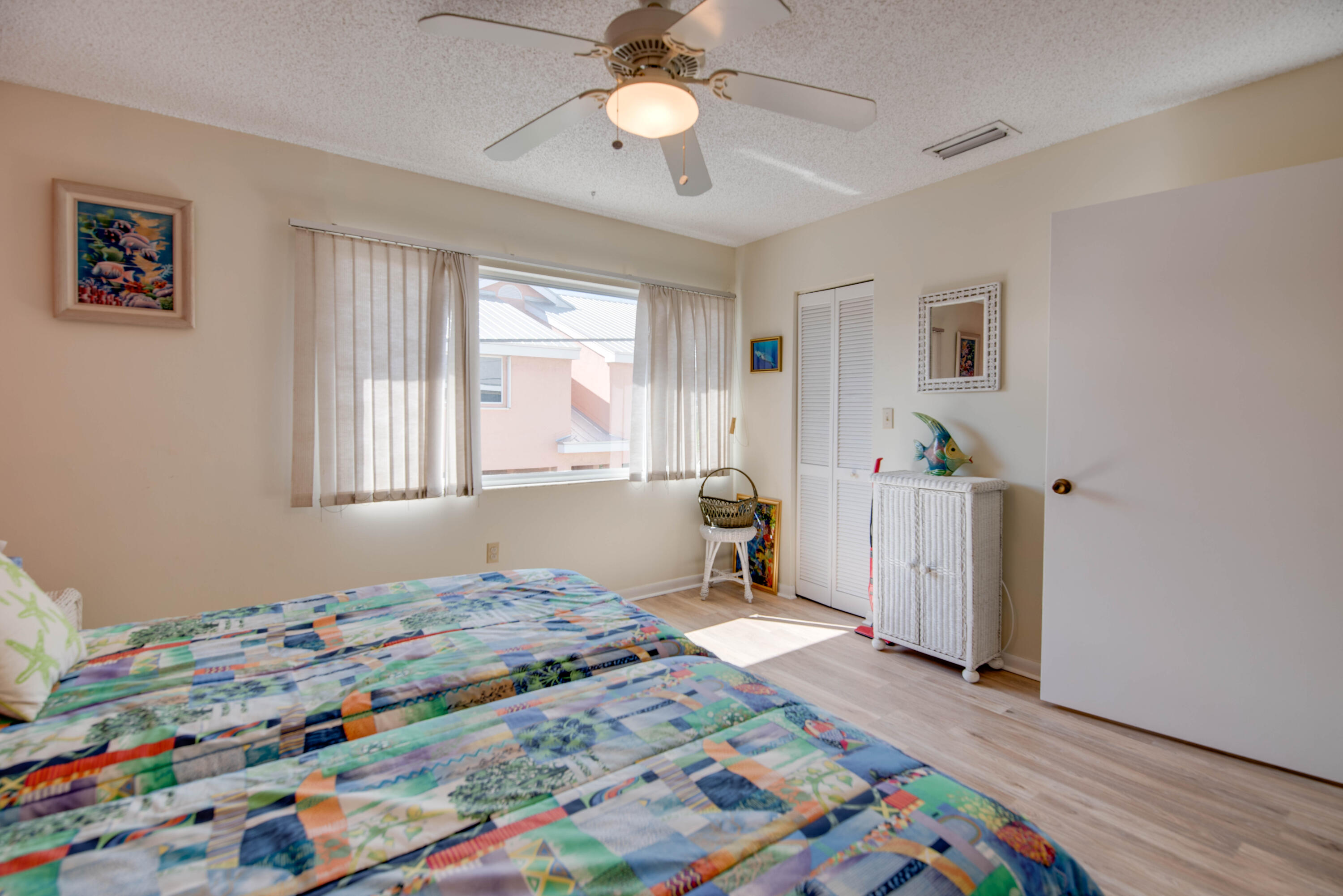 9867 Leeward Avenue Key Largo, FL 33037 - Photo 15 of 32 a bedroom with bed and window