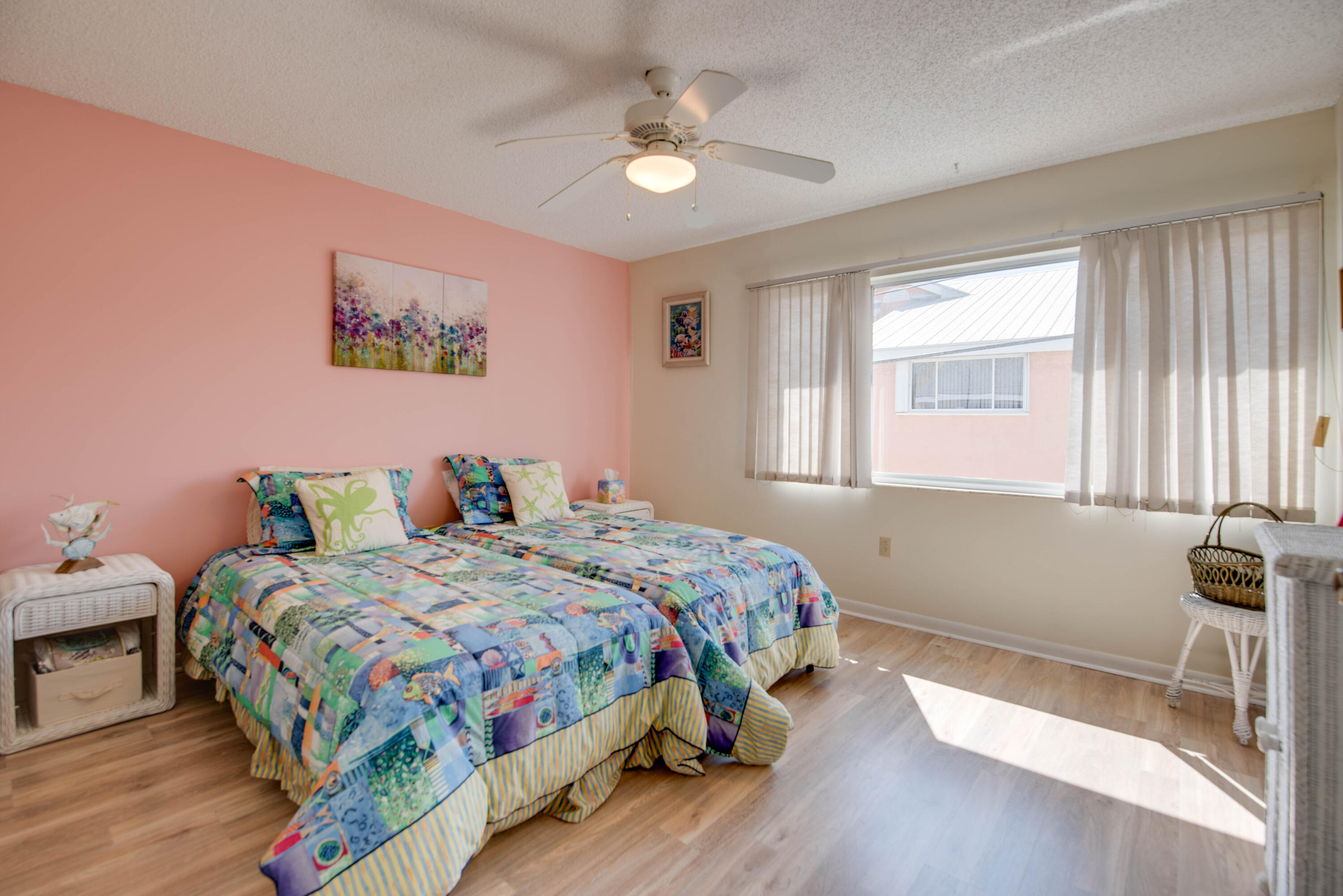 9867 Leeward Avenue Key Largo, FL 33037 - Photo 16 of 32 a bedroom with a bed and a window