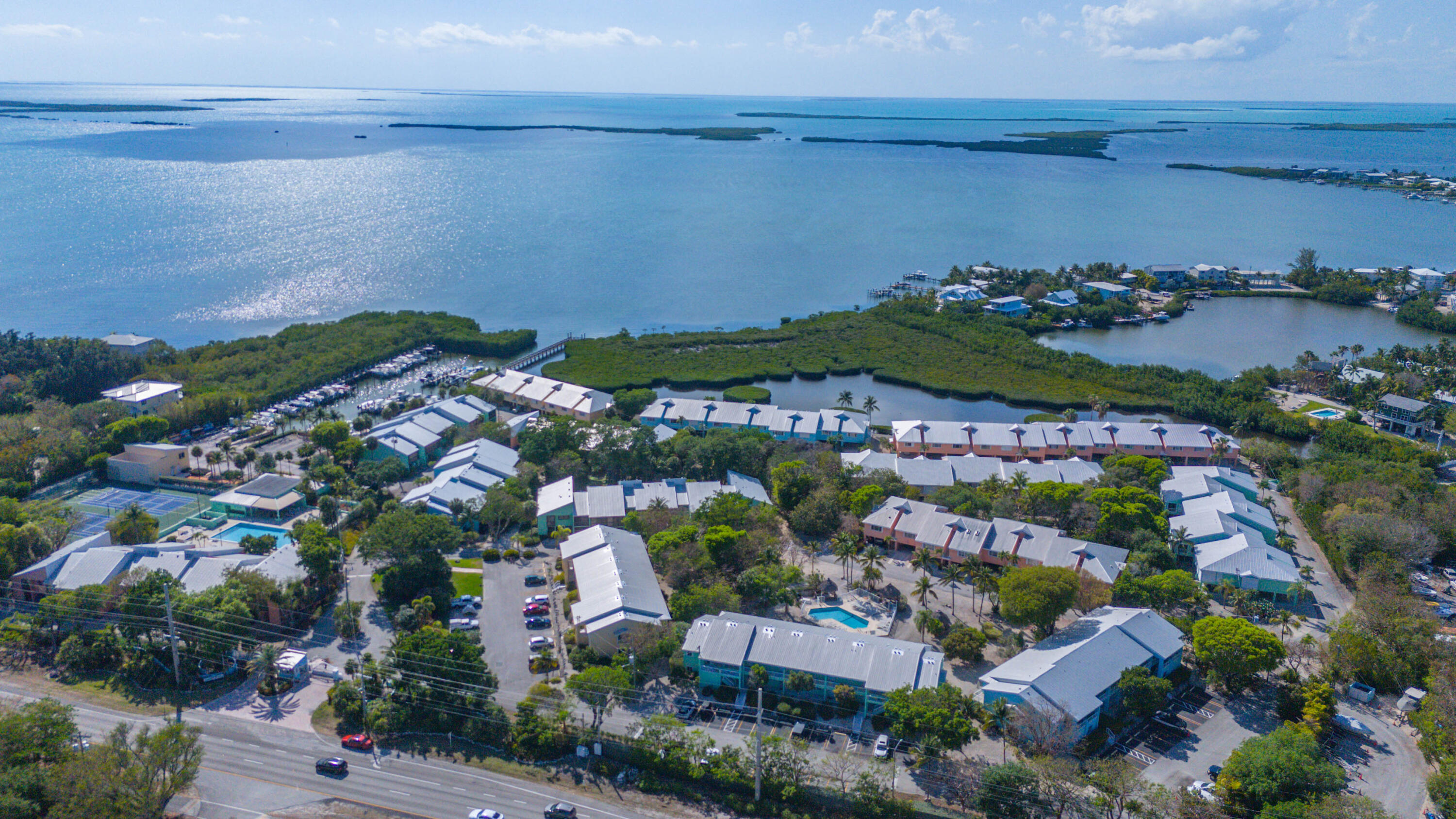9867 Leeward Avenue Key Largo, FL 33037 - Photo 2 of 32 an aerial view of multiple house