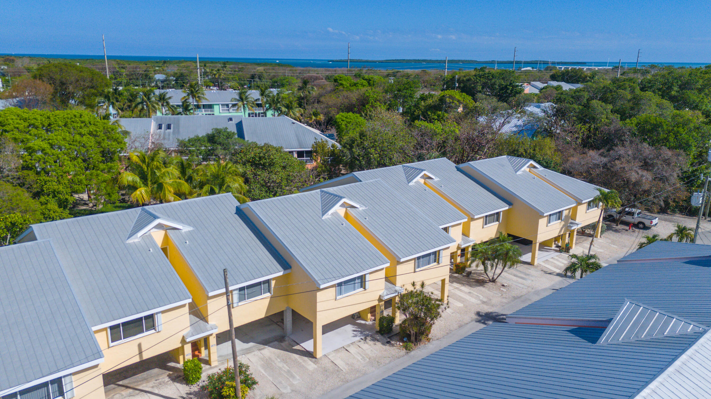 9867 Leeward Avenue Key Largo, FL 33037 - Photo 21 of 32 an aerial view of a house with outdoor space and street view