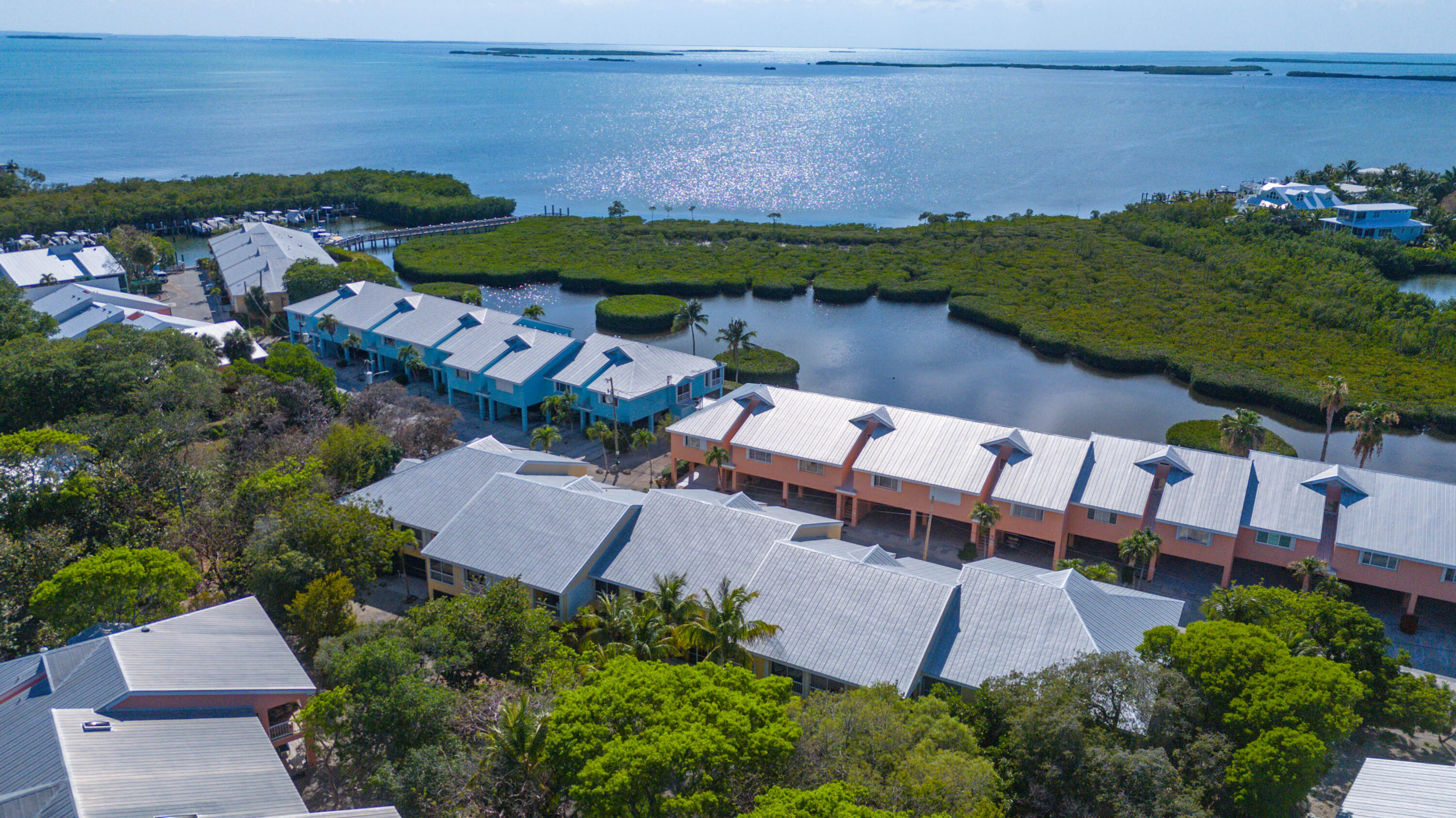 9867 Leeward Avenue Key Largo, FL 33037 - Photo 22 of 32 an aerial view of a house with a lake view