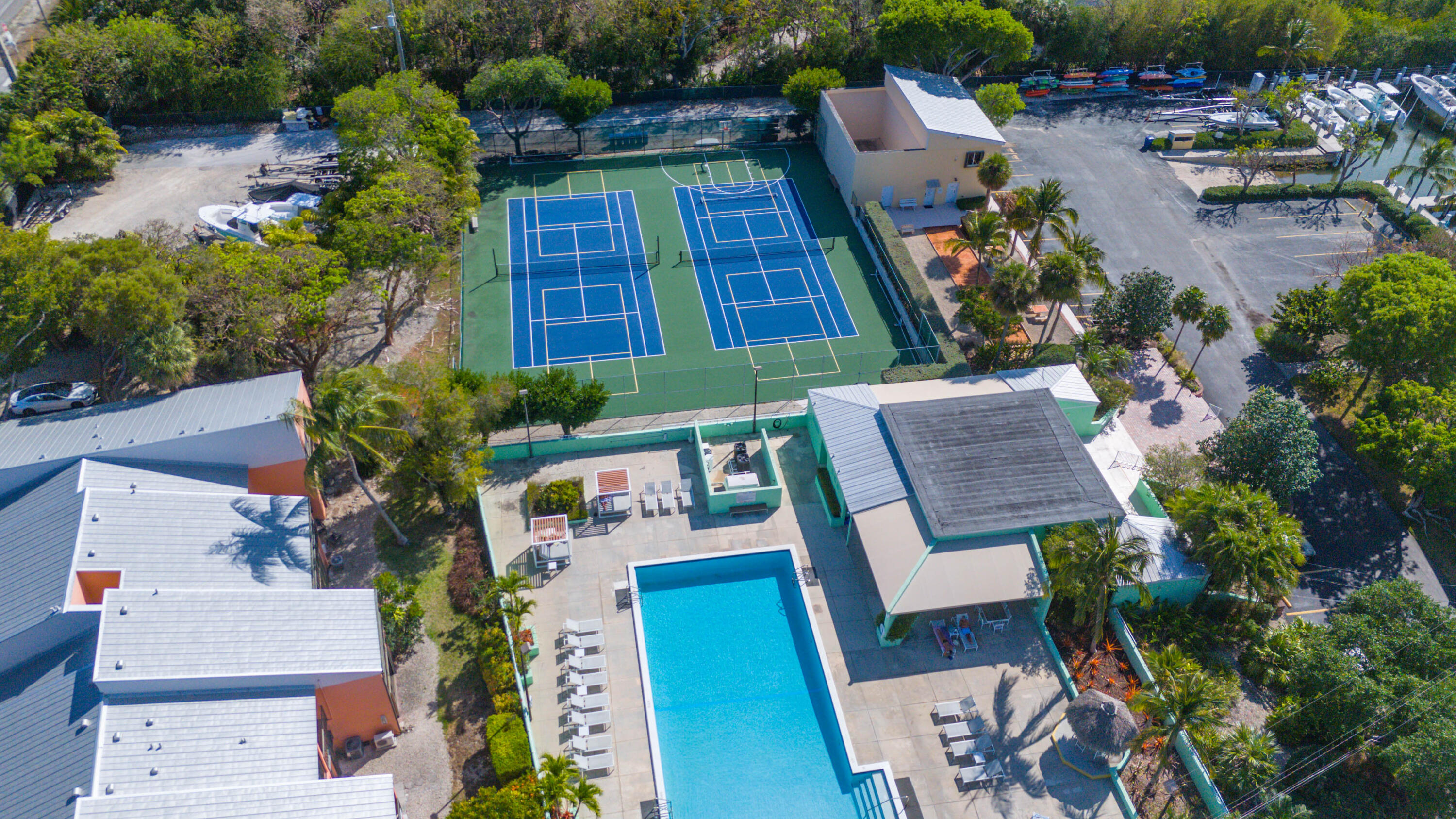 9867 Leeward Avenue Key Largo, FL 33037 - Photo 24 of 32 an aerial view of a house with garden space and street view