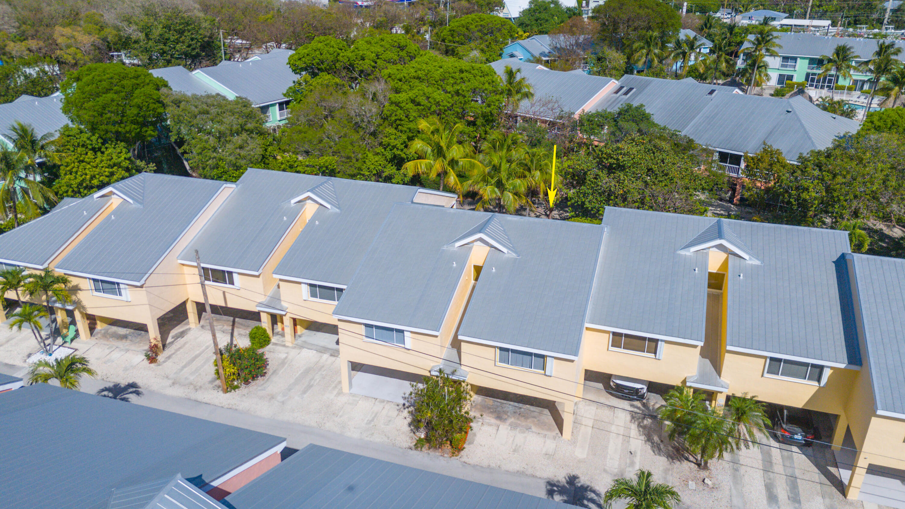 9867 Leeward Avenue Key Largo, FL 33037 - Photo 32 of 32 an aerial view of a house with garden space and street view
