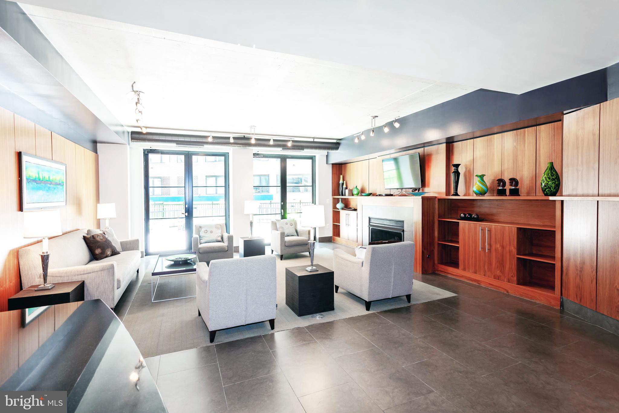 1133 14th Street Northwest, Unit 1109 Washington, DC 20005 - Photo 20 of 25 2nd Floor Community Room & Access to Large Patio