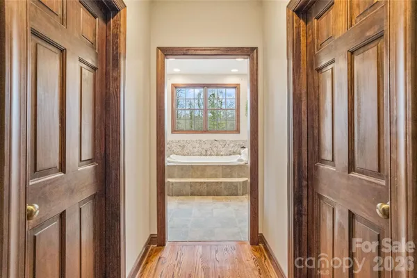a bathroom with a bathtub and shower