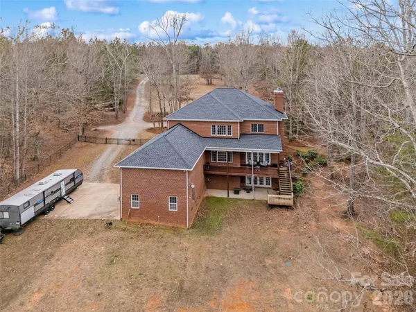 a view of a field with an ocean